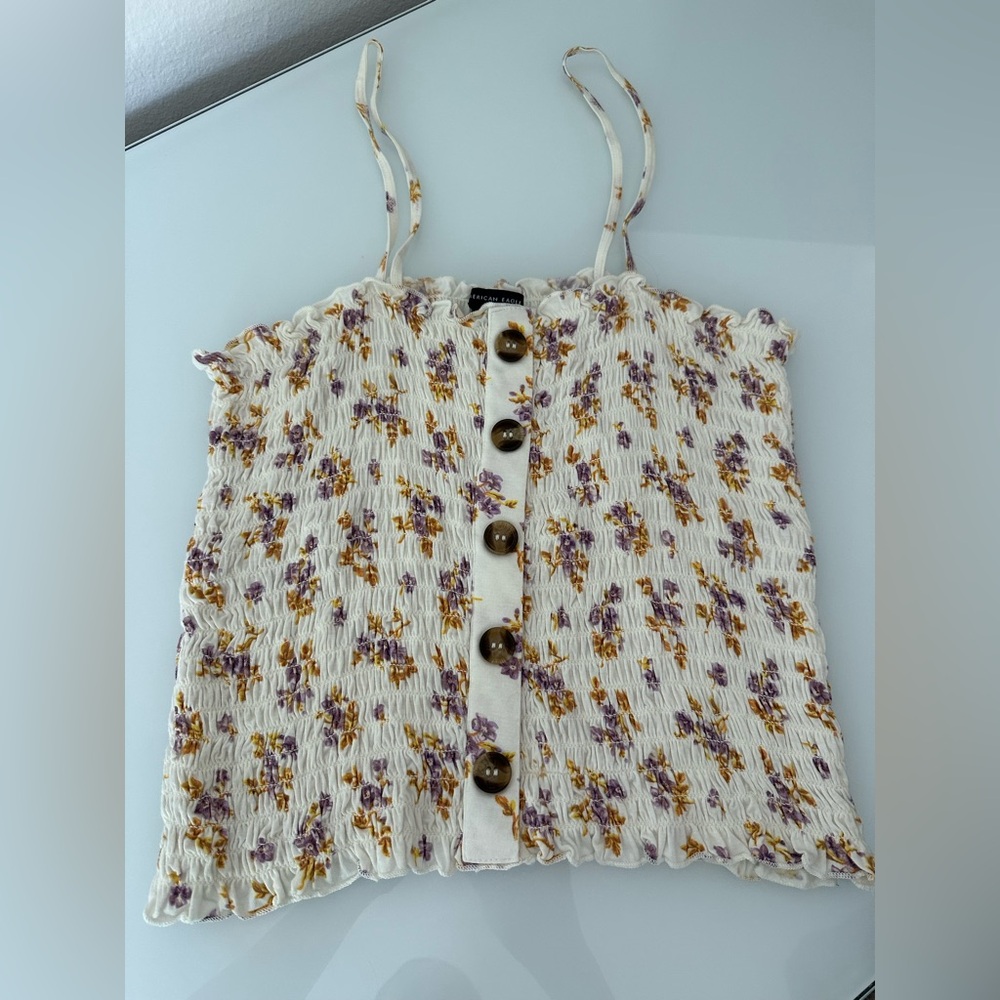 American Eagle tank top medium, white with yellow and purple flowers.NWOT
